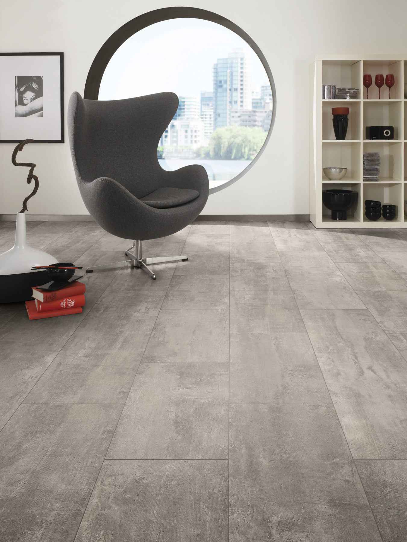 Organic Classic Crosstown Traffic room scene Organic Classic Crosstown Traffic 8mm grey tile-effect laminate flooring in a modern living room