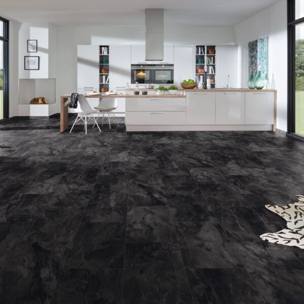 Organic Classic Nightfall Slate 8mm dark grey laminate flooring in a modern kitchen