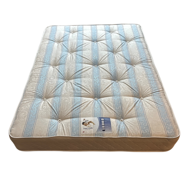 Super Ortho open coil mattress with blue and cream tufted cover